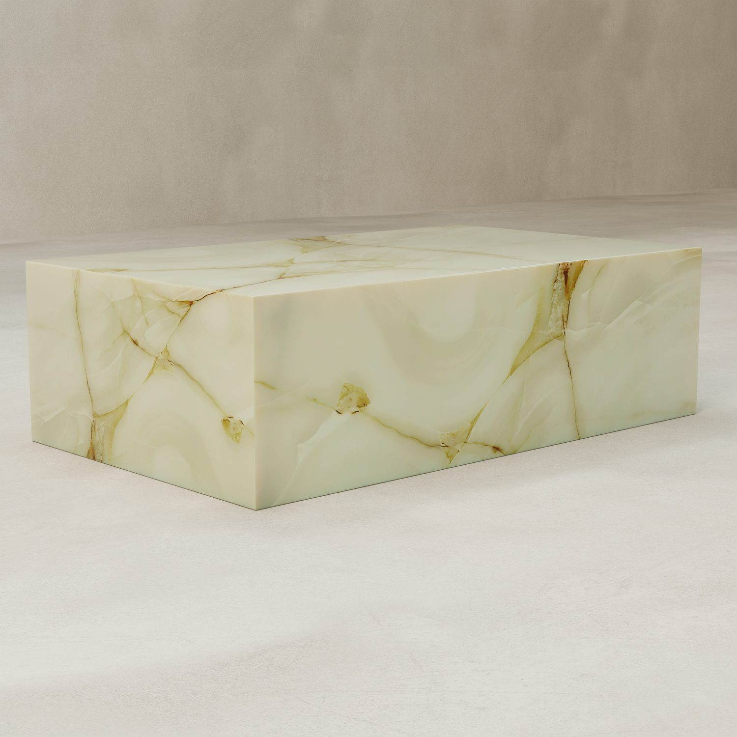 The Blanchaire Onyx Coffee Table, rectangular and light green with a luminous finish and delicate beige-gold veining, rests on a smooth light-colored floor against a neutral wall.
