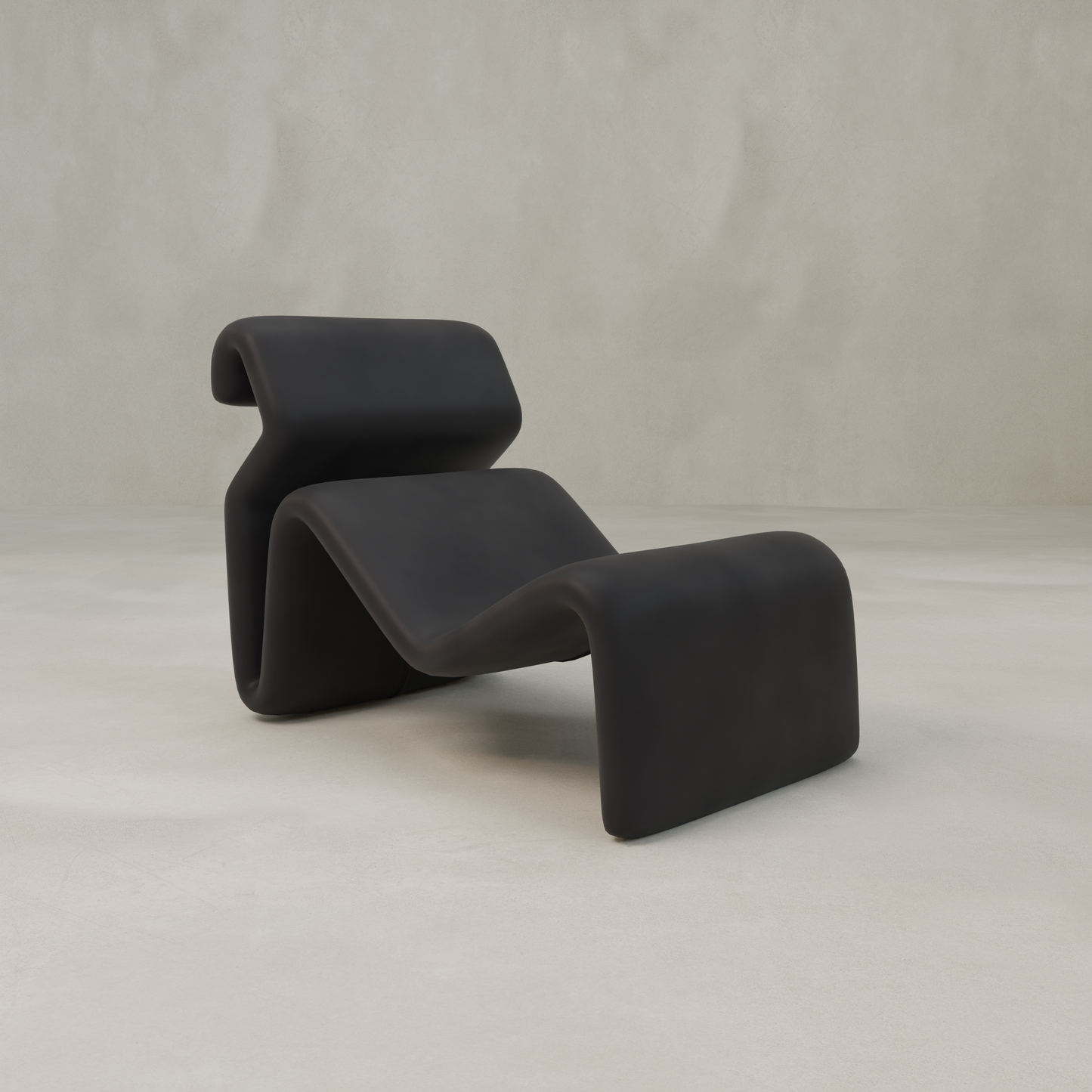 The Infinity Chaise Lounge features a modern, minimalist black design with smooth curves and a sculptural form inspired by 70s aesthetics, set against a plain, light-colored background.