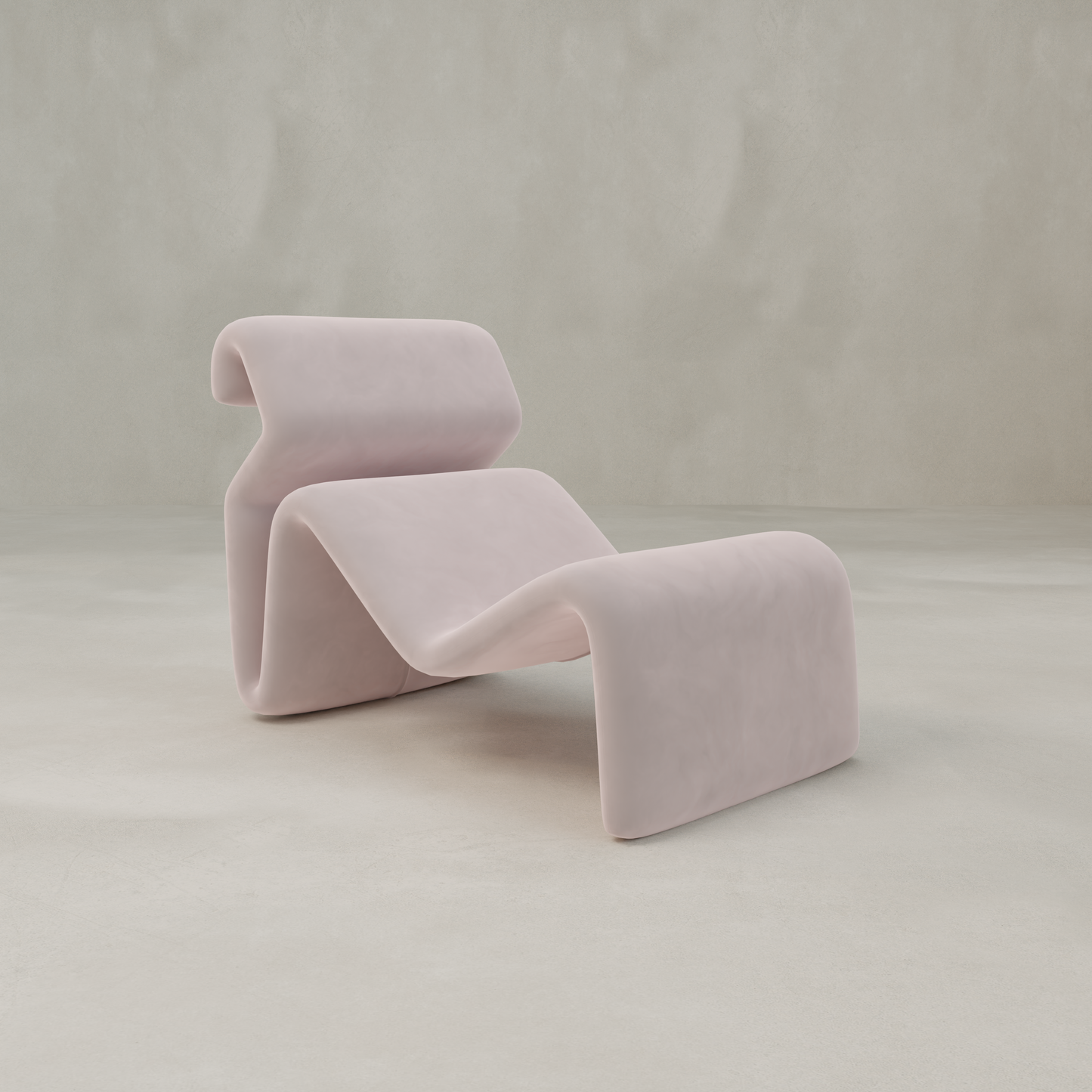 The Infinity Chaise Lounge features smooth, pastel pink velvet upholstery and wave-like curves, creating a modern sculptural statement inspired by 70s aesthetics—perfect against a neutral backdrop.