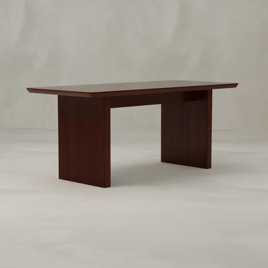 The Kensington Dining Table is a modern rectangular table made from dark brown wood with ribbed legs and a smooth top, perfectly suited for minimalist interiors.