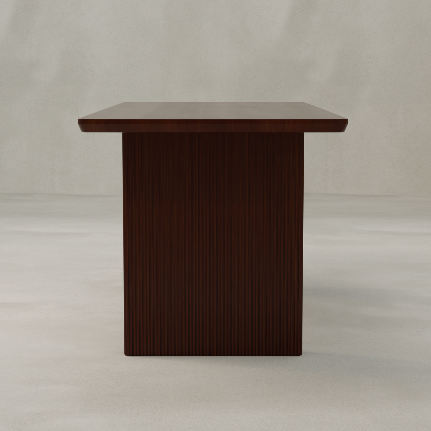 The Kensington Dining Table is a dark brown wood piece featuring a single solid pedestal base, displayed against a plain light-gray background.