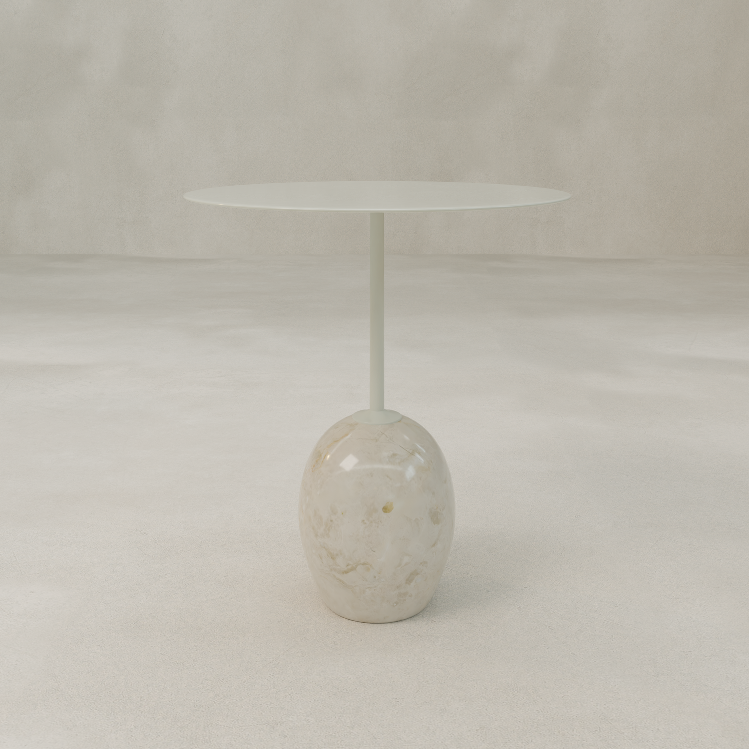 The Le Folie Table Crema Short features a slim, white round tabletop supported by a single stone leg on a glossy, marble-like oval base. Set against a neutral, minimal background.