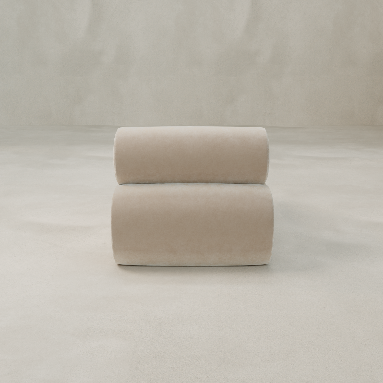 The Nuage Modular Lounge Chair, featuring a modern beige boucle upholstery and rounded, cylindrical design, sits on a light floor against a textured wall—offering a sculptural, minimalist statement for any decor.