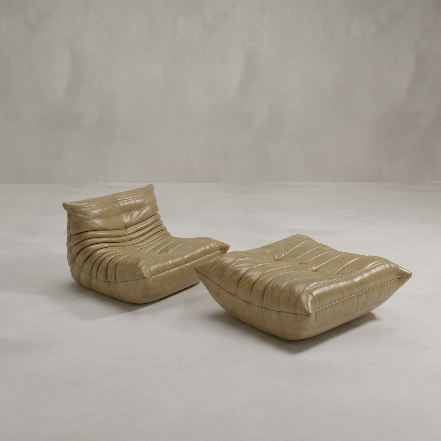The Rolo Lounge Sofa Chair with Ottoman features a 70s-inspired tan leather design with tufted, ruched detailing, shown on a plain, light-toned background.