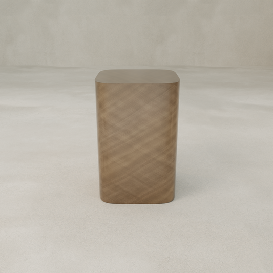 The Solaris Side Table Square, a tall rectangular piece with rounded corners, stands on a smooth, light-colored surface against a plain, light background.