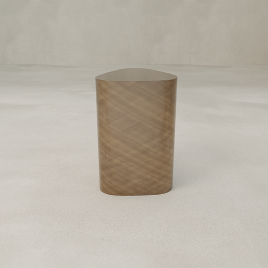 The Solaris Side Table Triangle is a small, modern wooden piece with a rounded triangular top and smooth sides, showcasing minimalist design on a light floor against a neutral backdrop.