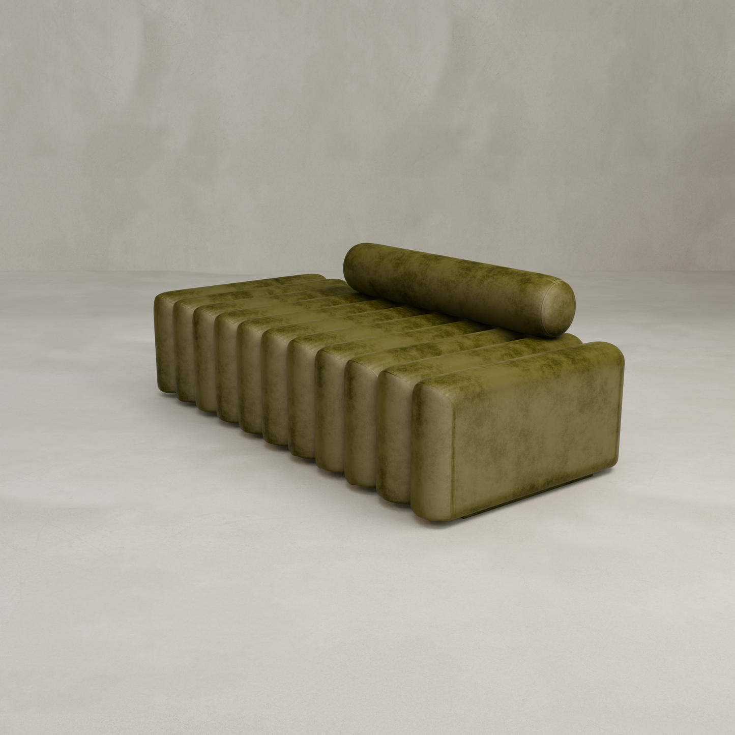 The Sonorra Bench Large is a modern olive-green modular sofa with rectangular cushions, a cylindrical headrest, and quilted velvet upholstery, shown against a plain light-colored background.