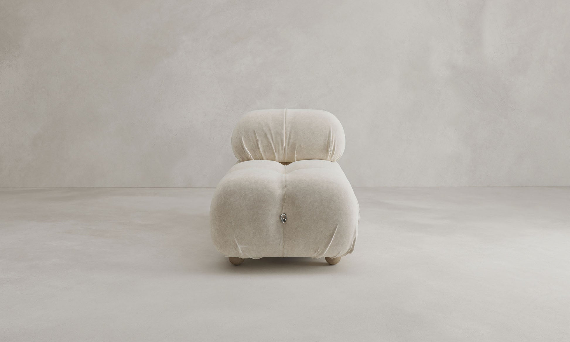 The Belmont Chair 2/3Rd Modular Sectional features modern, plush, armless seating with light beige upholstery and rounded edges, echoing the cloud sofa trend against a plain light gray background.