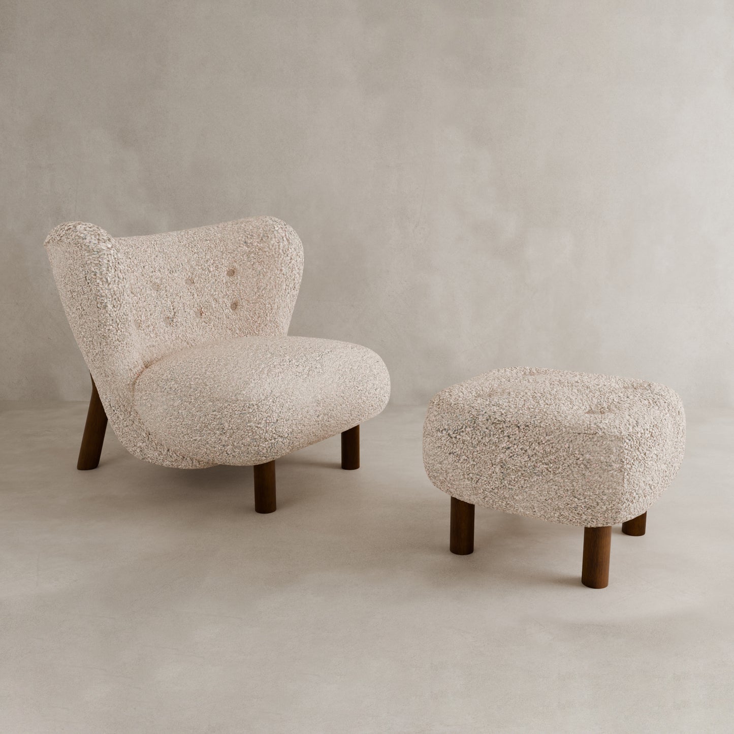 The Highgate Chair With Ottoman features a modern curved design in cream boucle vegan shearling with button tufting, both resting on a neutral floor against a plain background.