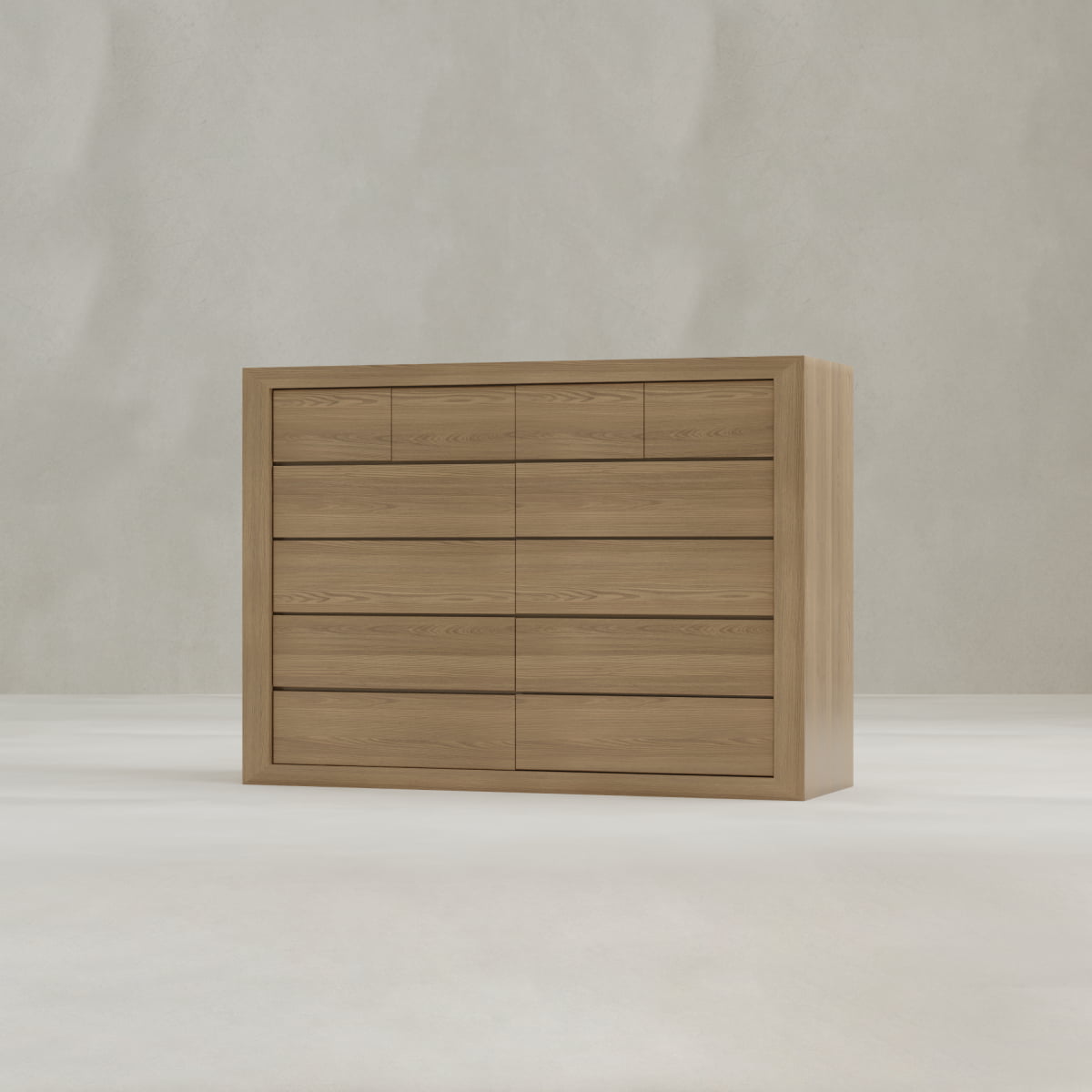The Ashford Large Dresser is a modern piece crafted from light oak with clean lines and nine horizontal drawers, displayed against a plain, light-colored background.