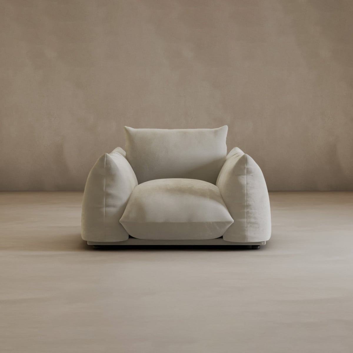 The Calypso Arm Chair offers plush comfort with rounded cushions and soft light beige upholstery, bringing modern elegance to any room with its neutral tone and sleek design.