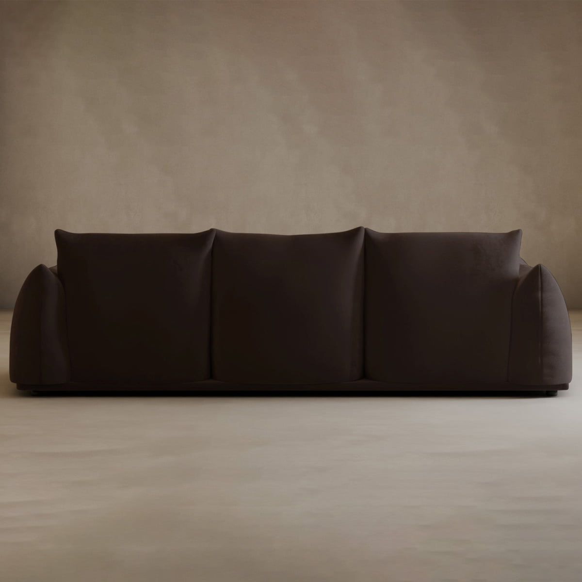 The Calypso Three Seater Sofa, featuring three spacious cushions, is set against a light beige wall and floor, offering a clean and elegant look for any modern living room.