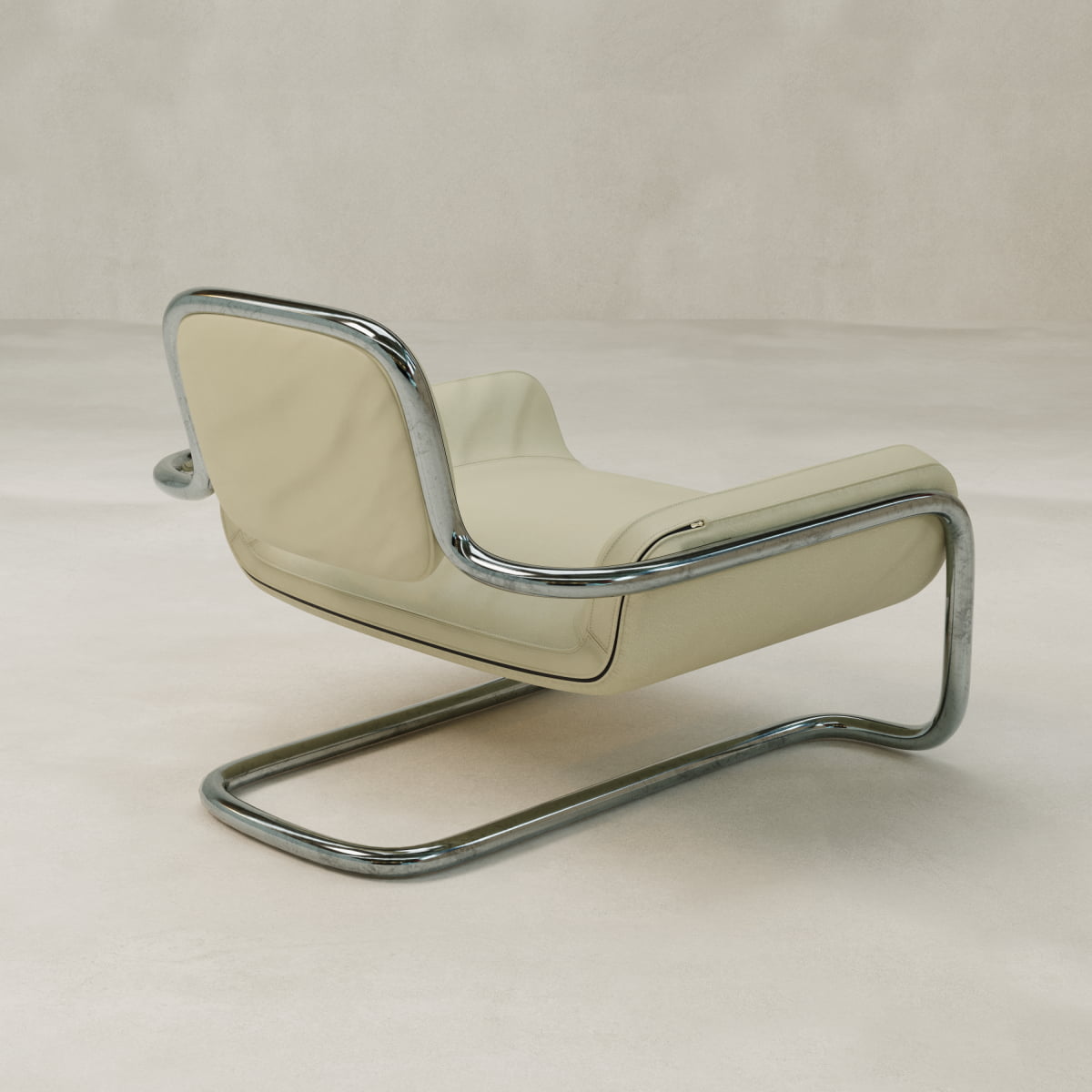 The Citron Chair features a sleek, curved chrome frame with light beige cushions, blending modern aesthetics and minimalist, cantilevered design.