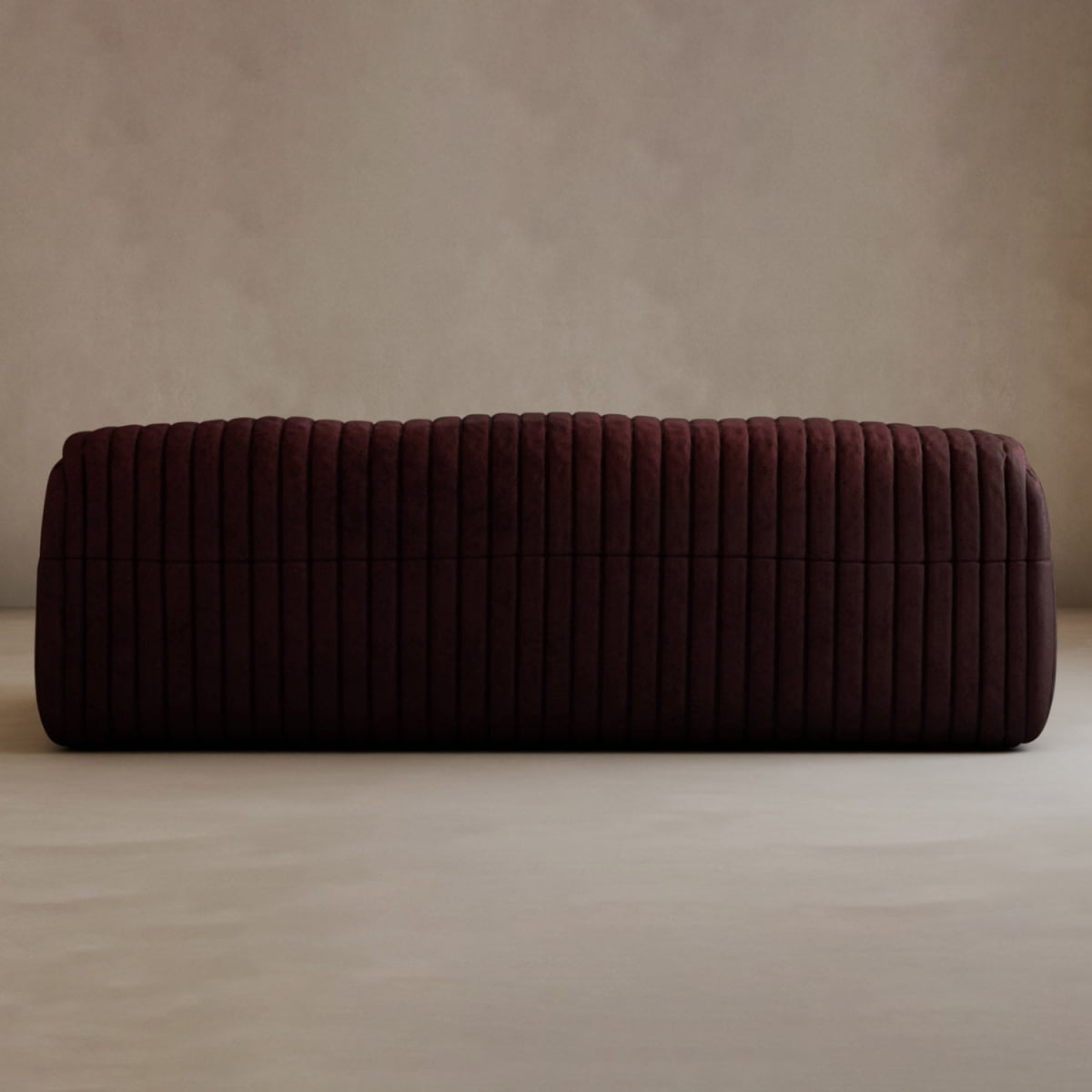 The Calypso Armchair, with its sleek rectangular shape and dark brown tufted stripe design, brings modern elegance to any space, especially when placed against a beige wall on a light floor.