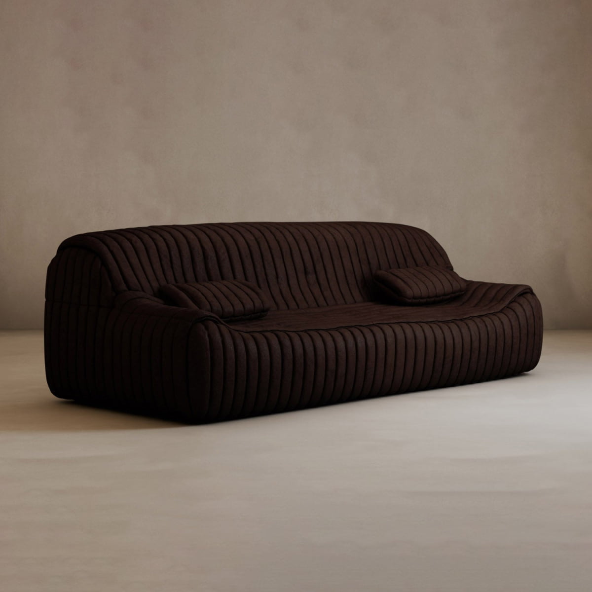 A modern, dark brown Calypso Armchair with a tufted stripe design and two matching cushions, set against a plain beige wall and light floor in a minimalist room.