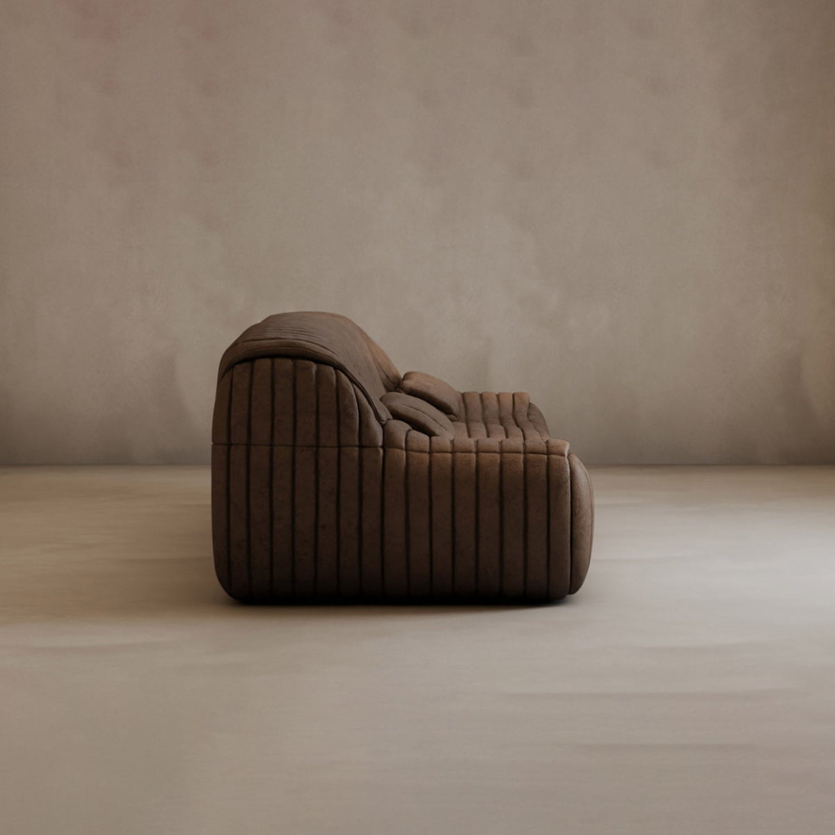 A brown Calypso Armchair with a tufted stripe design stands on a light, plain floor against a beige, textured wall. The armchair is viewed from the side, highlighting its soft curves and modern elegance.