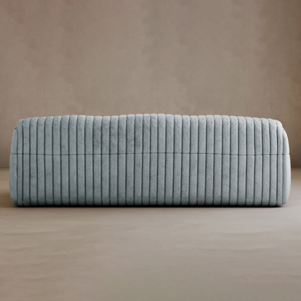 A modern, rectangular ottoman upholstered in light grey fabric with a tufted stripe design, set against a neutral beige background—perfect for pairing with the Calypso Armchair.