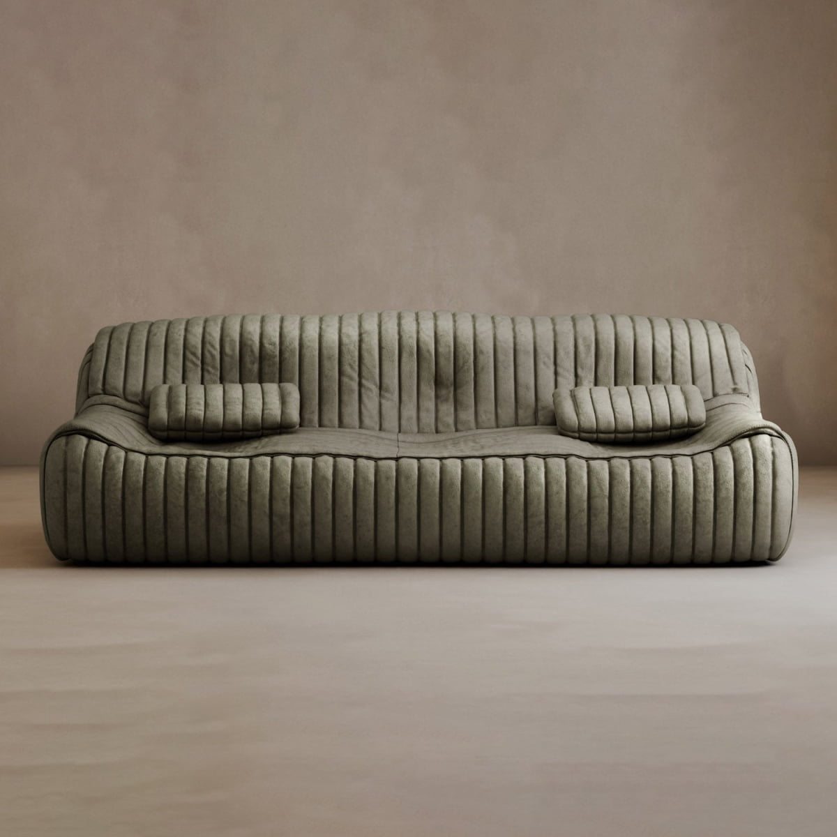 A modern, low-profile Calypso Armchair featuring a tufted stripe design and two matching rectangular cushions, upholstered in muted olive-green fabric, set against a plain beige wall and floor.