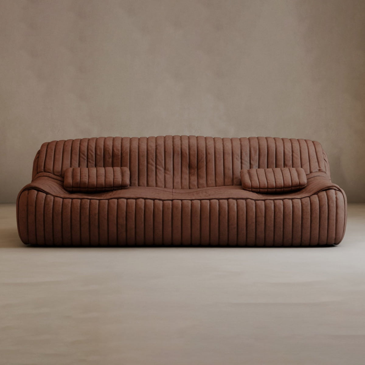 A modern, low-profile brown Calypso Armchair with vertical tufted stripe design and two matching rectangular cushions, set against a plain beige wall and floor, exudes modern elegance.