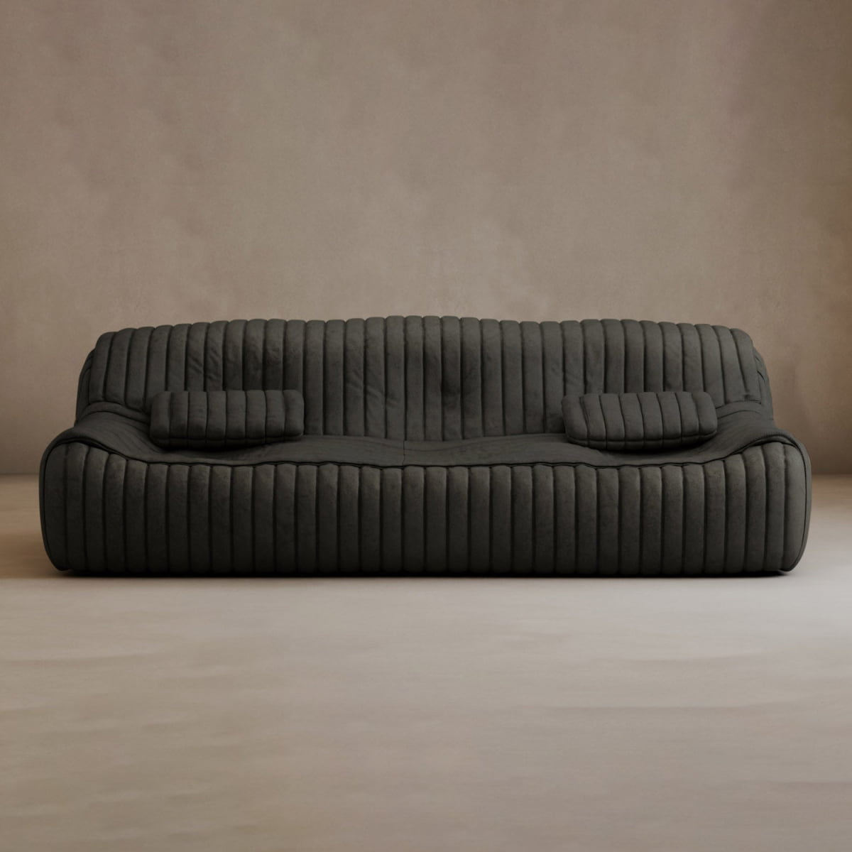 The Calypso Armchair embodies modern elegance with a dark gray, low-profile frame, vertical tufted stripe design, and two matching rectangular cushions against a neutral-toned background.