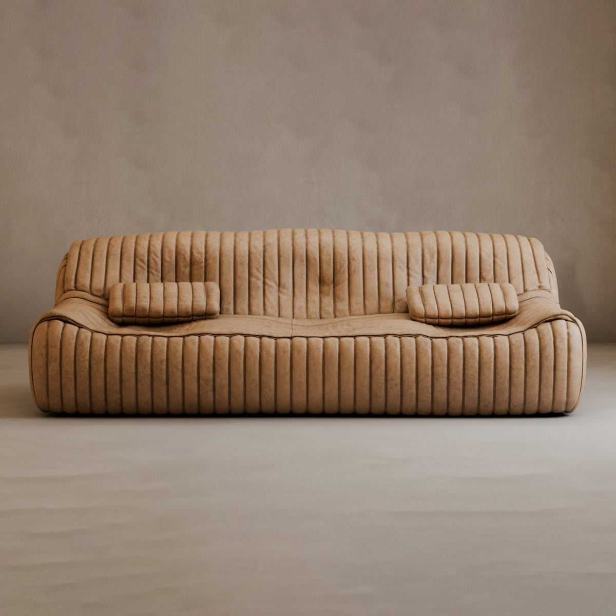 A modern tan Calypso Armchair with a tufted stripe design and two matching rectangular cushions stands out against a plain beige wall and floor, highlighting contemporary style and elegant design.