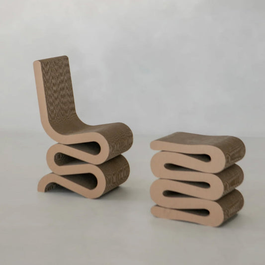 The Curly Wurly Chair and its matching stool feature wavy cardboard layers in neutral brown tones, presented against a plain light background for a contemporary aesthetic.