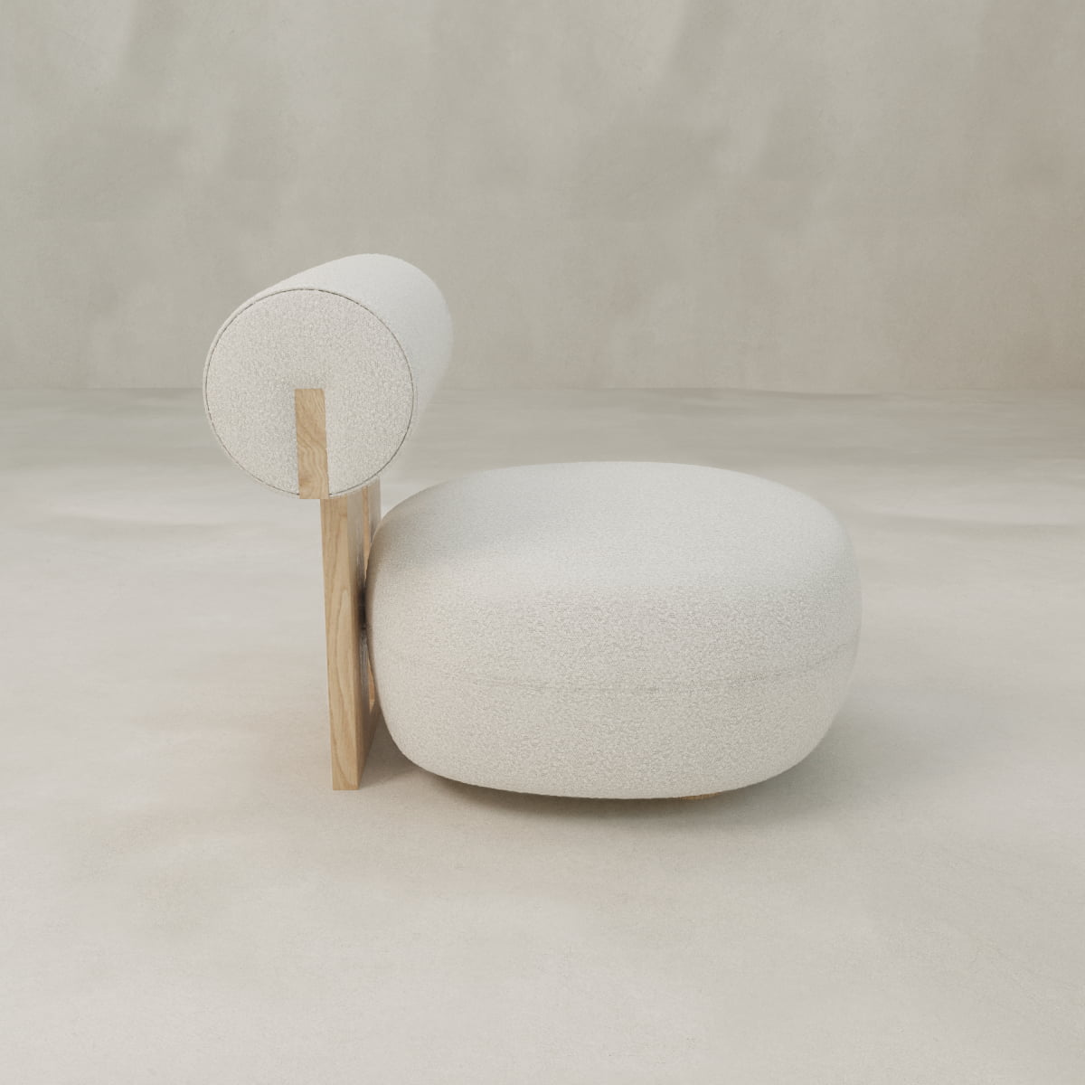 The Finchley Chair features a rounded, cushioned seat and cylindrical backrest in off-white fabric, solid legs, and a sleek wooden profile set against a minimal beige background.