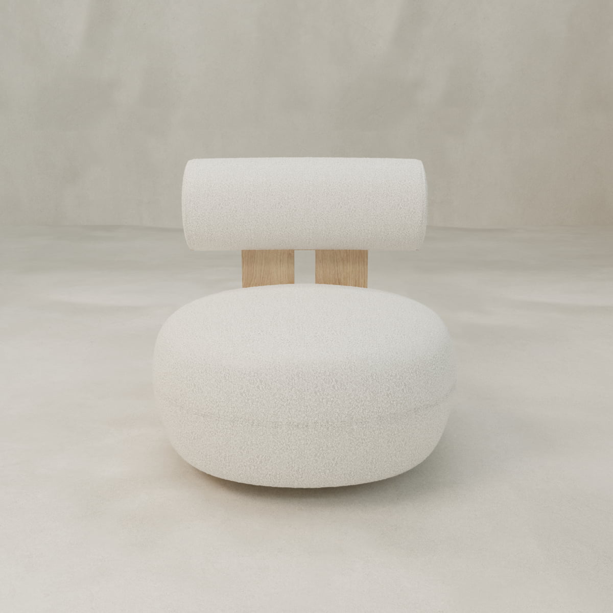 The Finchley Chair is a modern, minimalist piece featuring a round white cushioned seat, cylindrical white backrest, and two vertical wooden slats as supports, displayed against a plain, light-colored background.