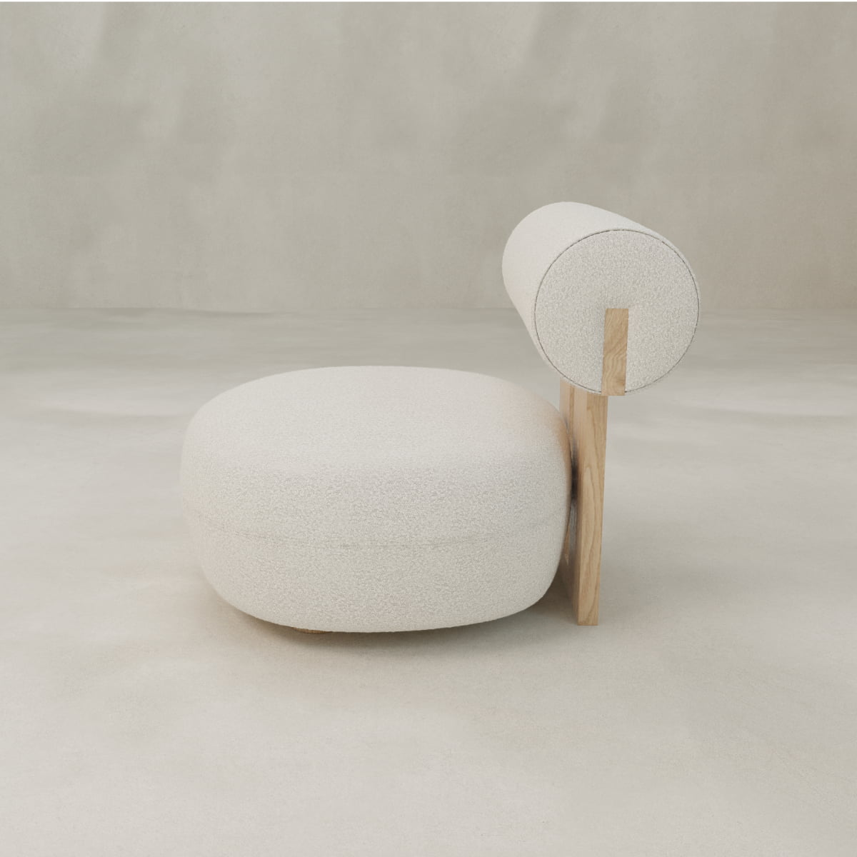 The Finchley Chair features a rounded white cushioned seat, cylindrical backrest, and solid legs with a light wooden profile, all set against a minimalist neutral background.