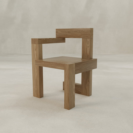 The Grafton Chair features a minimalist Brutalist design in solid oak, with angular, blocky shapes, straight lines, right angles, and a square seat, all set against a light, plain background.