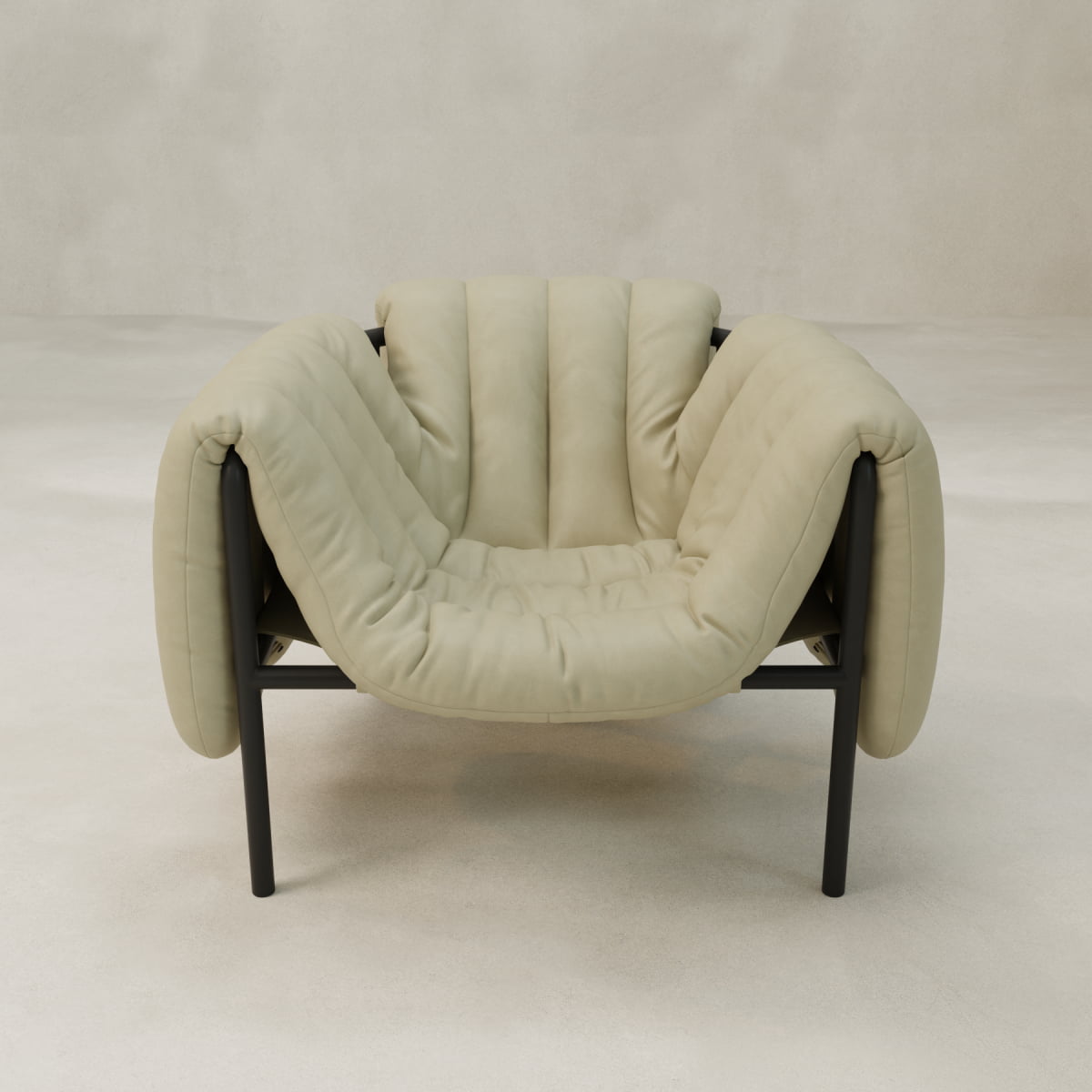 The Mallow Chair has a beige cushioned seat with deep channeled tufting and a sleek black sculptural tubular frame, set against a plain light background.