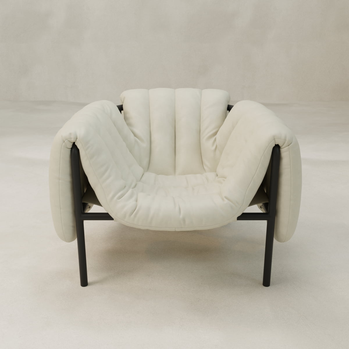 The Mallow Chair features a wide, cushioned seat with deep channeled tufting in soft off-white upholstery and a sculptural tubular frame, shown against a light, neutral background.