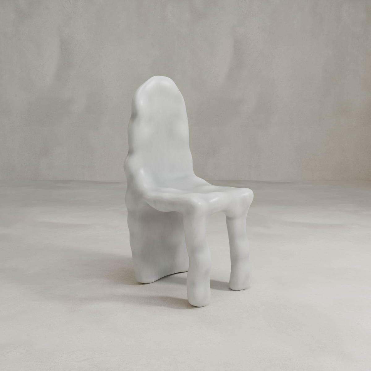 The Phantom Chair features a sculptural, wavy design in smooth light gray, with thick rounded legs and a tall, irregular backrest—modern craftsmanship highlighted against a neutral background.