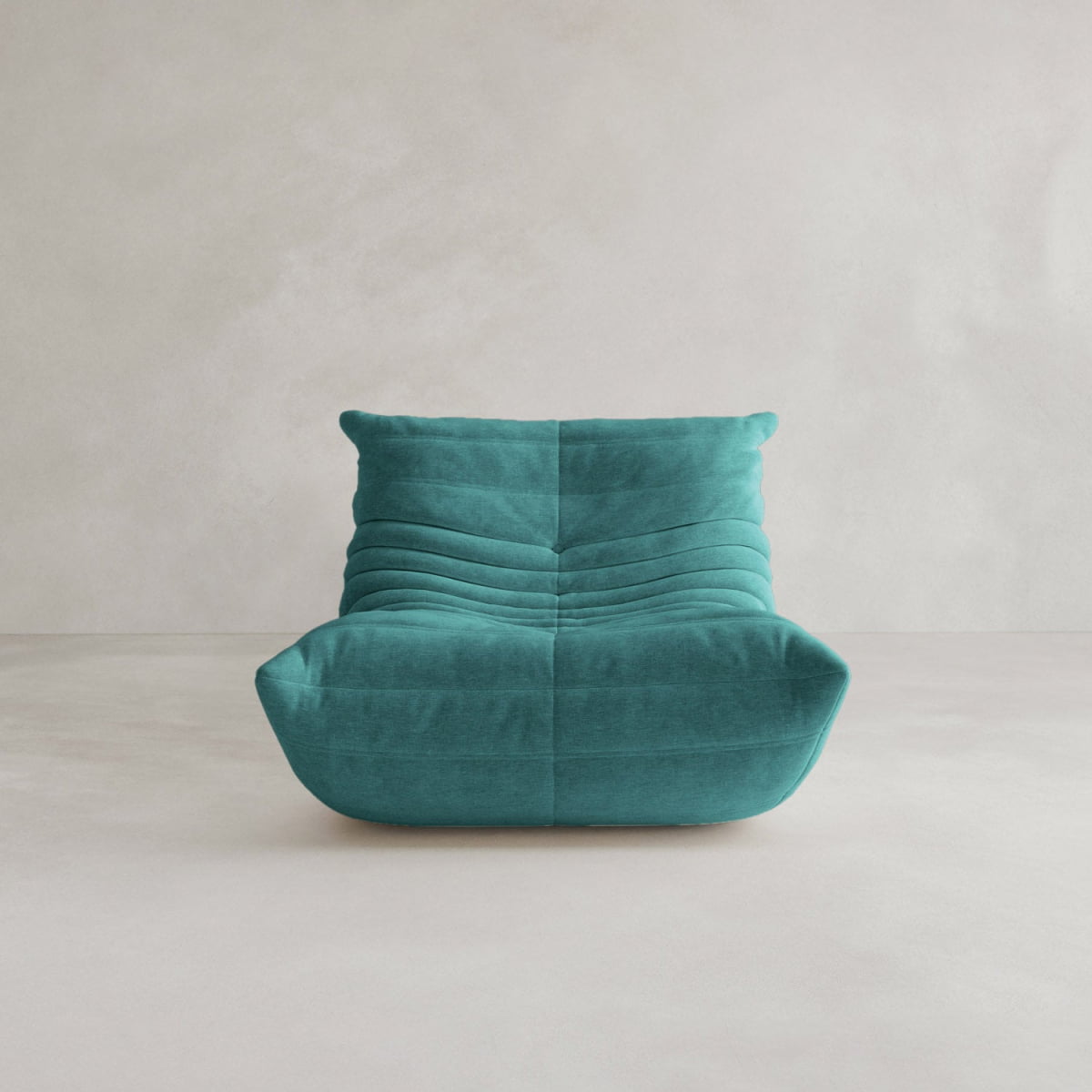 The Rolo Lounge Sofa Chair with Ottoman features a modern teal design, low cushioned seat, and horizontal tufted lines for a mid-century look, displayed against a plain light gray background.