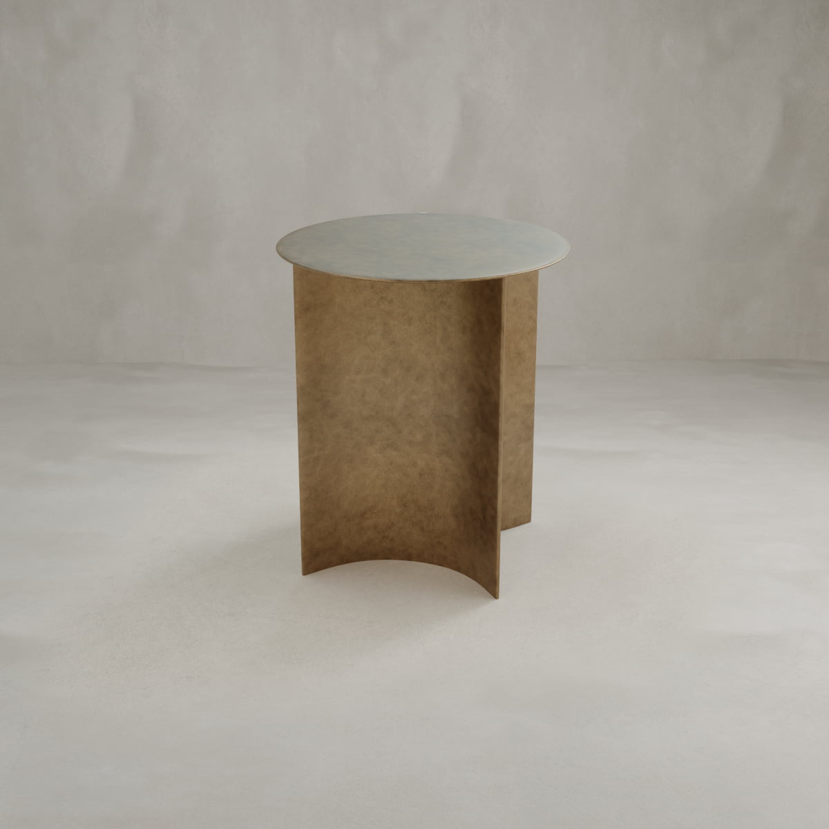 The Roma Coffee Table Tall features a small, round metallic design with a flat top and three curved vertical panels as its base, set against a light, neutral background to showcase its elegant style.