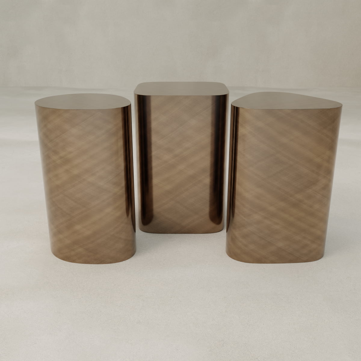 The Set of Solaris Side Table features three bronze, cylindrical stools with rounded edges that evoke modern luxury and minimalist design, arranged side by side on a light, neutral floor against a plain background.