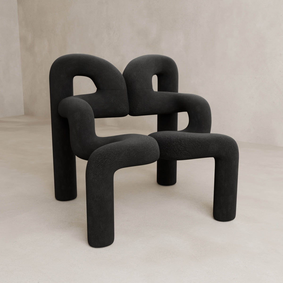 The Spider Chair Rental features neotenic geometry with thick, curved legs and armrests in a sculptural black design, creating a unique seating experience perfect for minimal, light interiors with textured floors and walls.