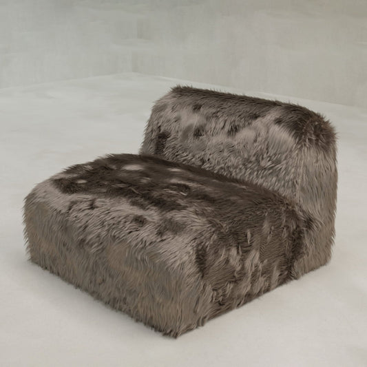 The Yeti One Seater Modular features a modern armless design with a low back and shaggy brown faux fur upholstery, making it the perfect addition to any contemporary living space.