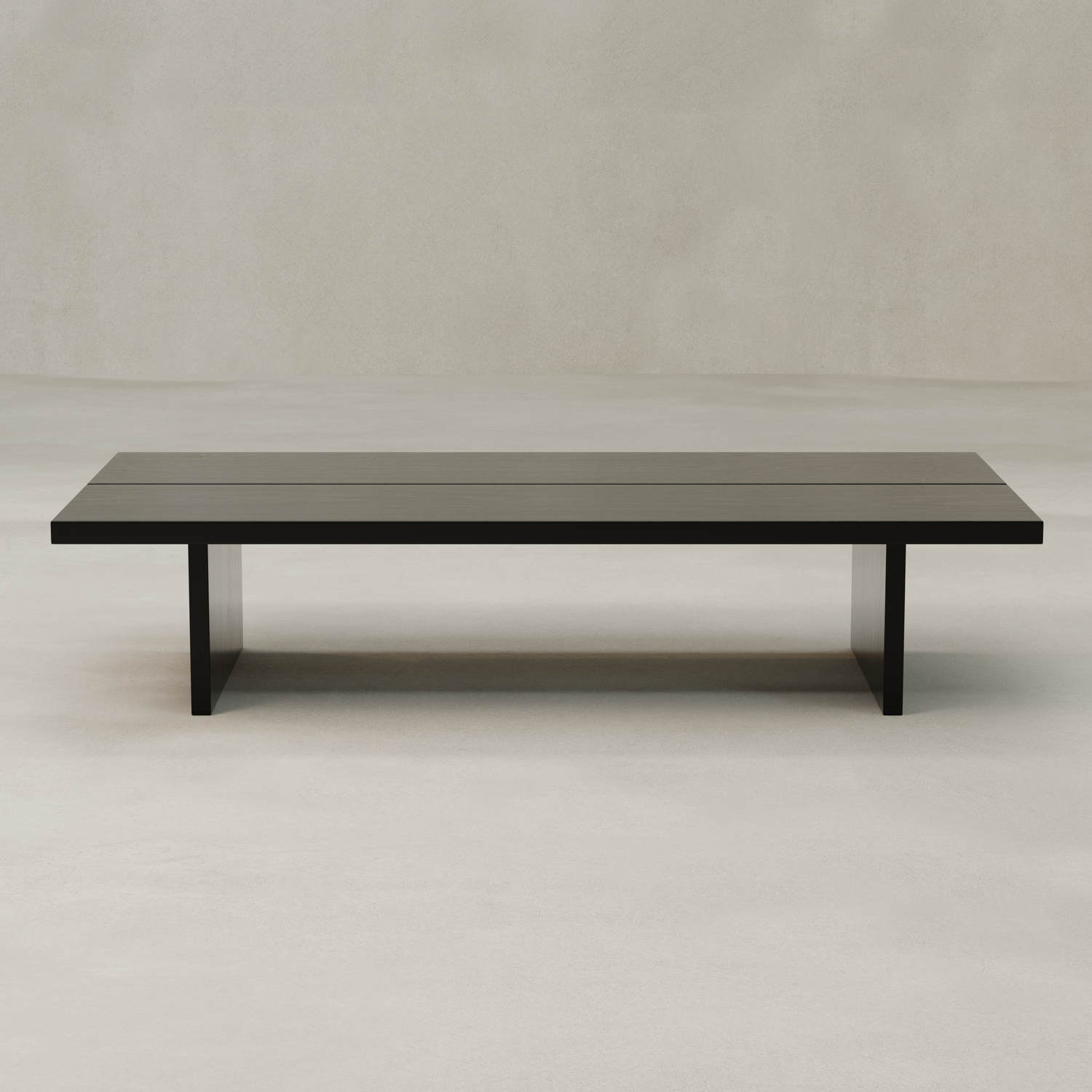 The Bastion Coffee Table showcases a minimalist rectangular design in solid pine, offering rustic charm with its dark finish and straight legs—perfect for neutral spaces with light flooring.