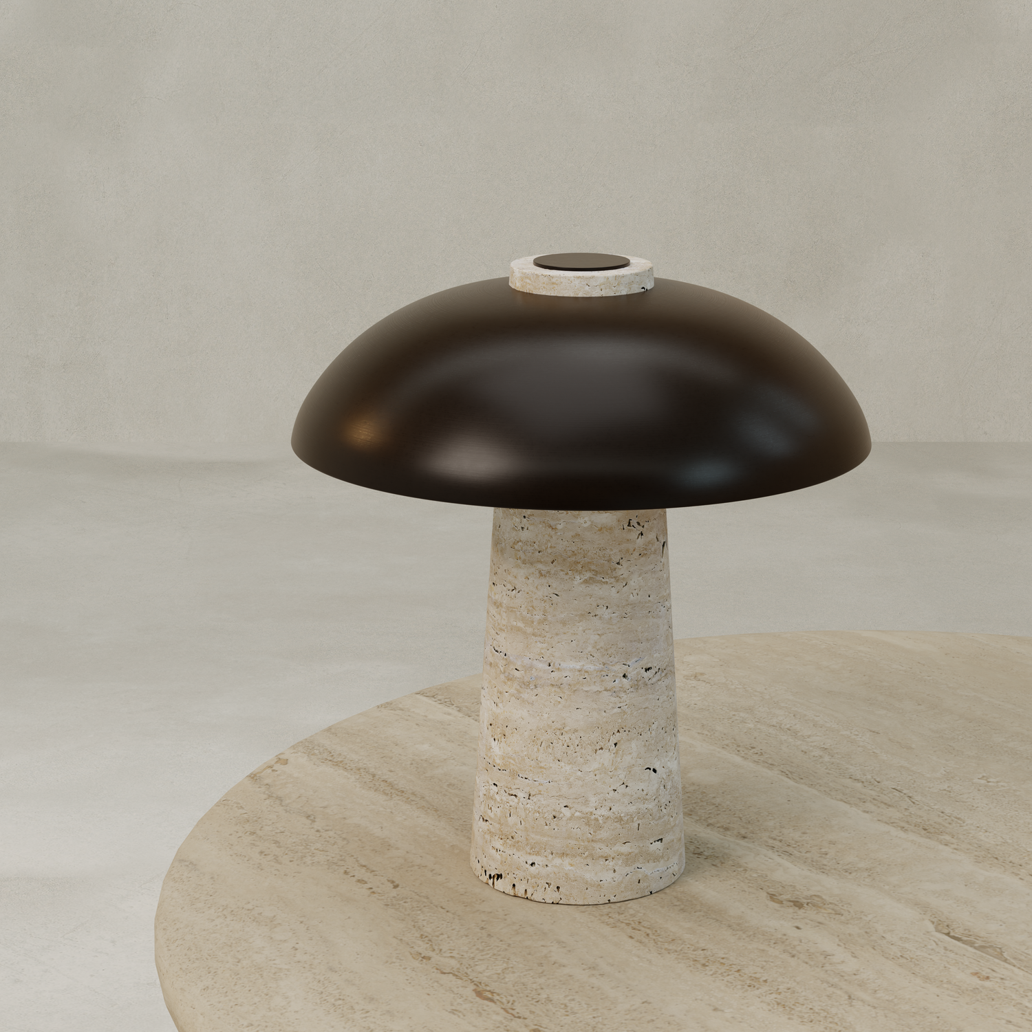 The Chiara Lamp, featuring a textured stone cylindrical base and a smooth dark brown dome shade, sits on a round light-colored stone surface against a neutral background.