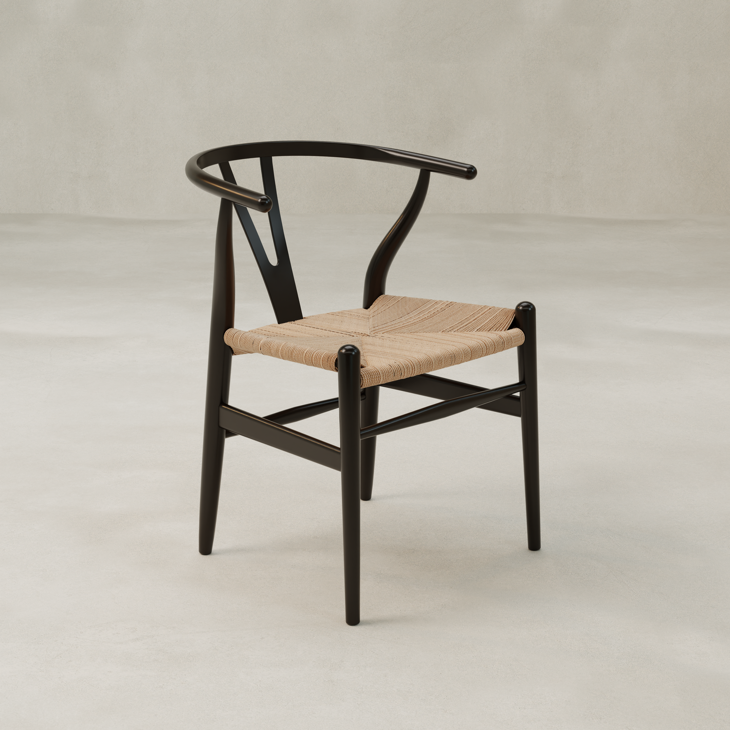 The Elsa Chair features a modern Y-back design with a curved backrest and woven natural fiber seat, showcased on a neutral, light-colored background.