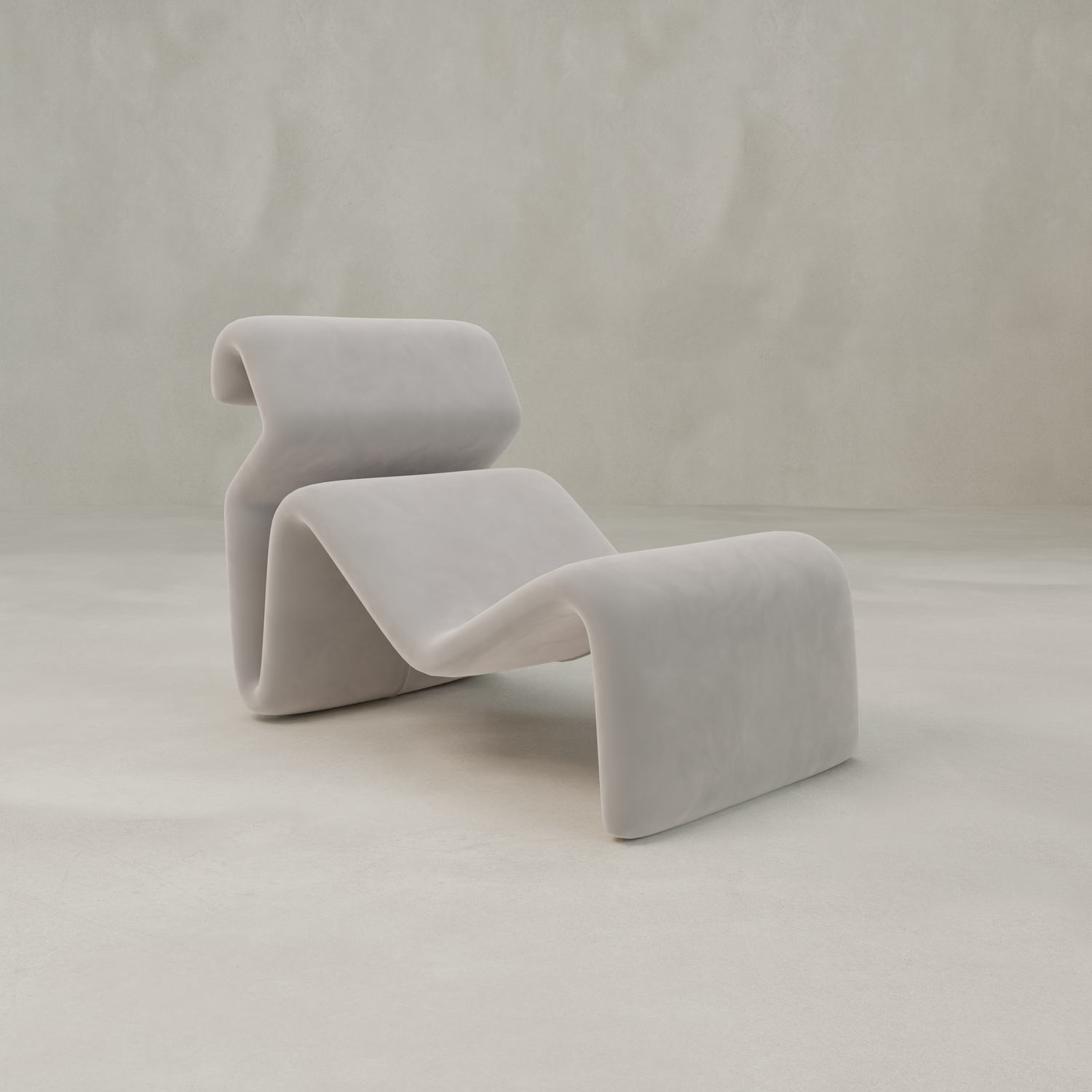The Infinity Chaise Lounge features smooth, curving lines and a light gray finish for a modern, minimalist look that channels 70s style—perfect as a statement piece against any neutral, textured background.