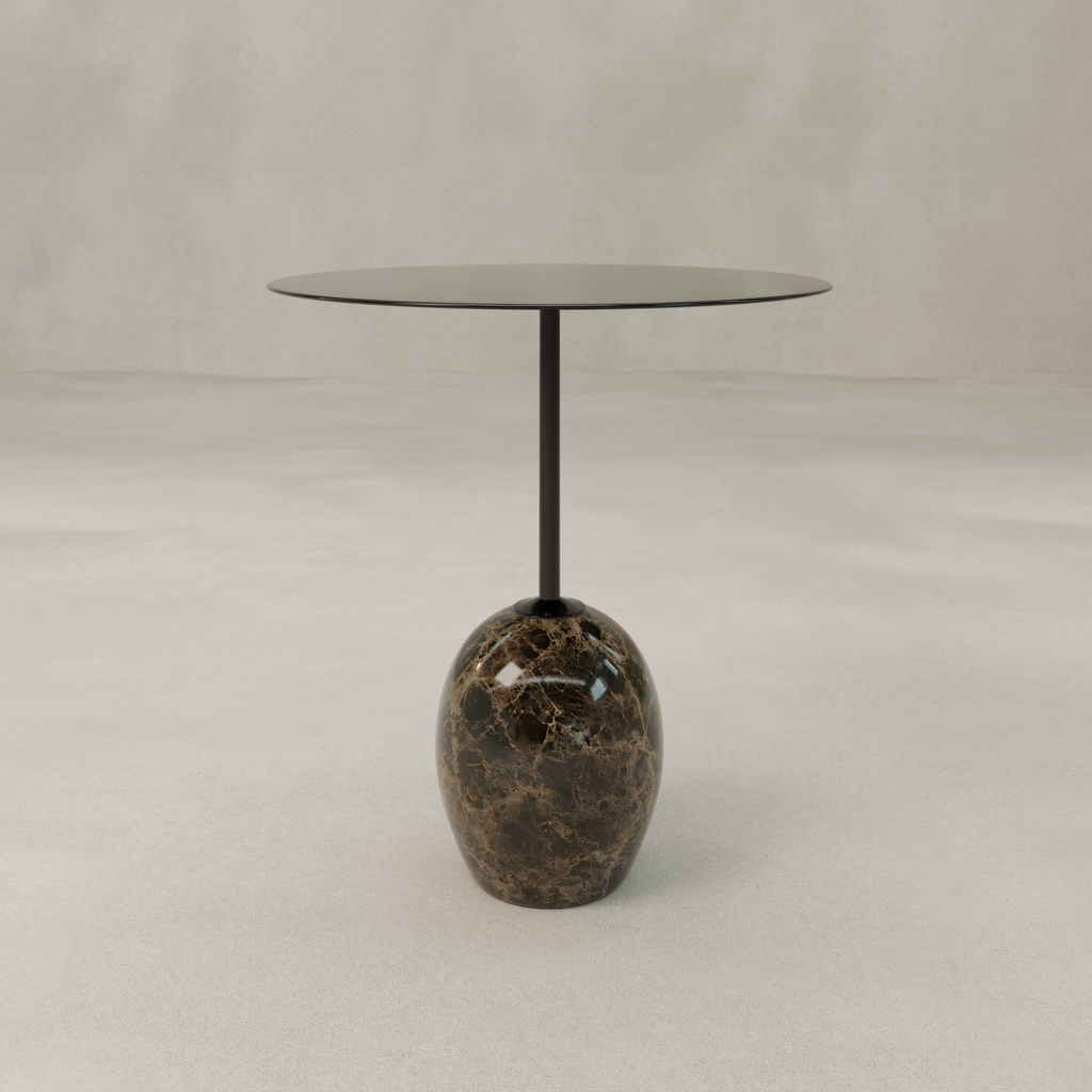 The Le Folie Table Noir Grand Antique Short features a slim black top, a central stem, and an eye-catching stone leg set in a glossy dark brown marble base, all shown against a plain light-colored background.