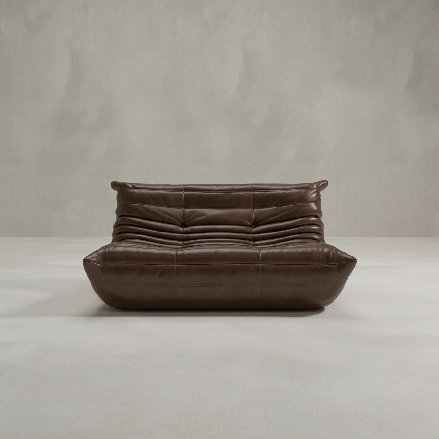 The Rolo Lounge Loveseat is a modern brown leather piece with a low profile, tufted backrest, and seat, showcasing mid-century design on a plain light gray background.