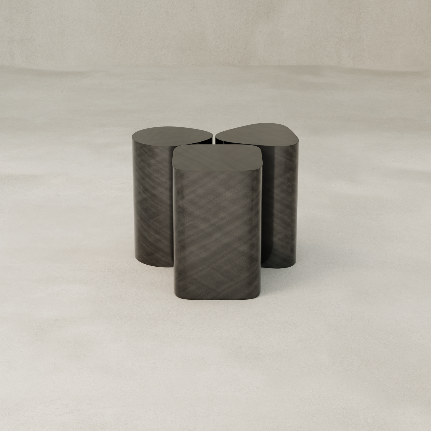 The Set of Solaris Side Table features a minimalist design with dark metal, three rounded rectangular legs meeting at the center, and stands on a smooth, light surface against a neutral background—exemplifying modern luxury.