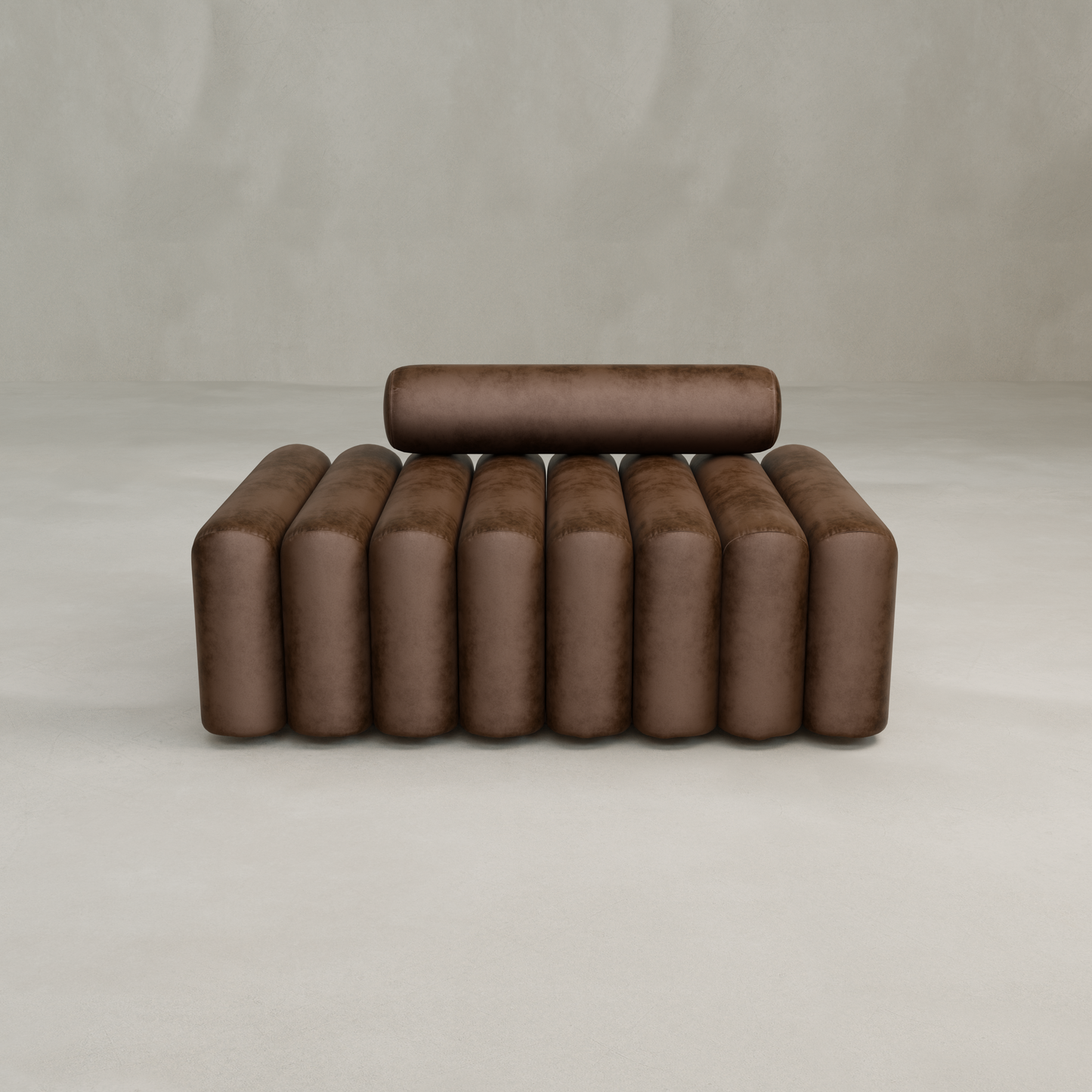 The Sonorra Bench Medium is a modern brown bench featuring plush seating and a cylindrical bolster backrest with vertical padded tubes, shown against a plain light gray background.