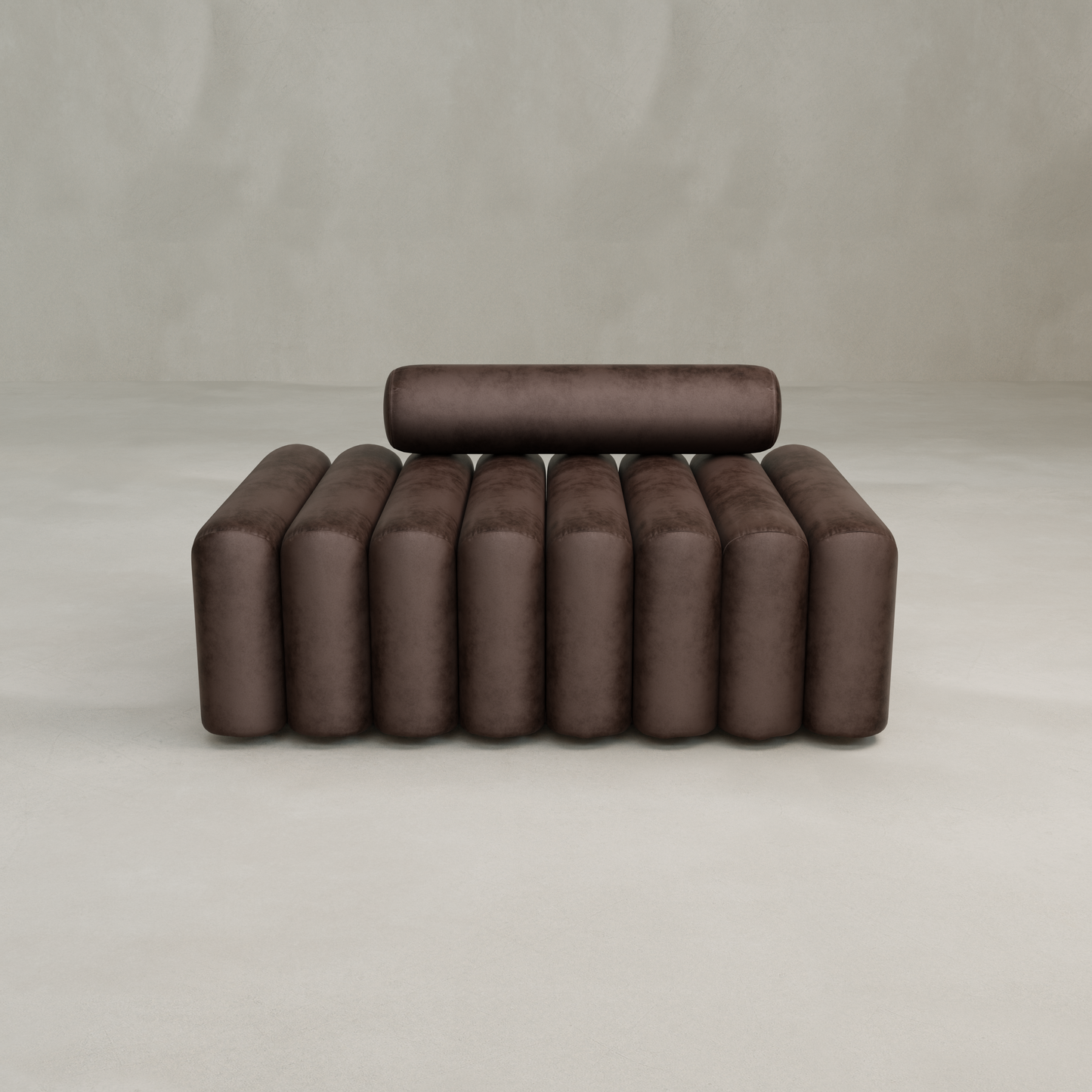The Sonorra Bench Medium is a modern, minimalist brown sofa with plush seating, featuring a cylindrical backrest and seat cushions in parallel vertical sections, set against a plain light-colored background.