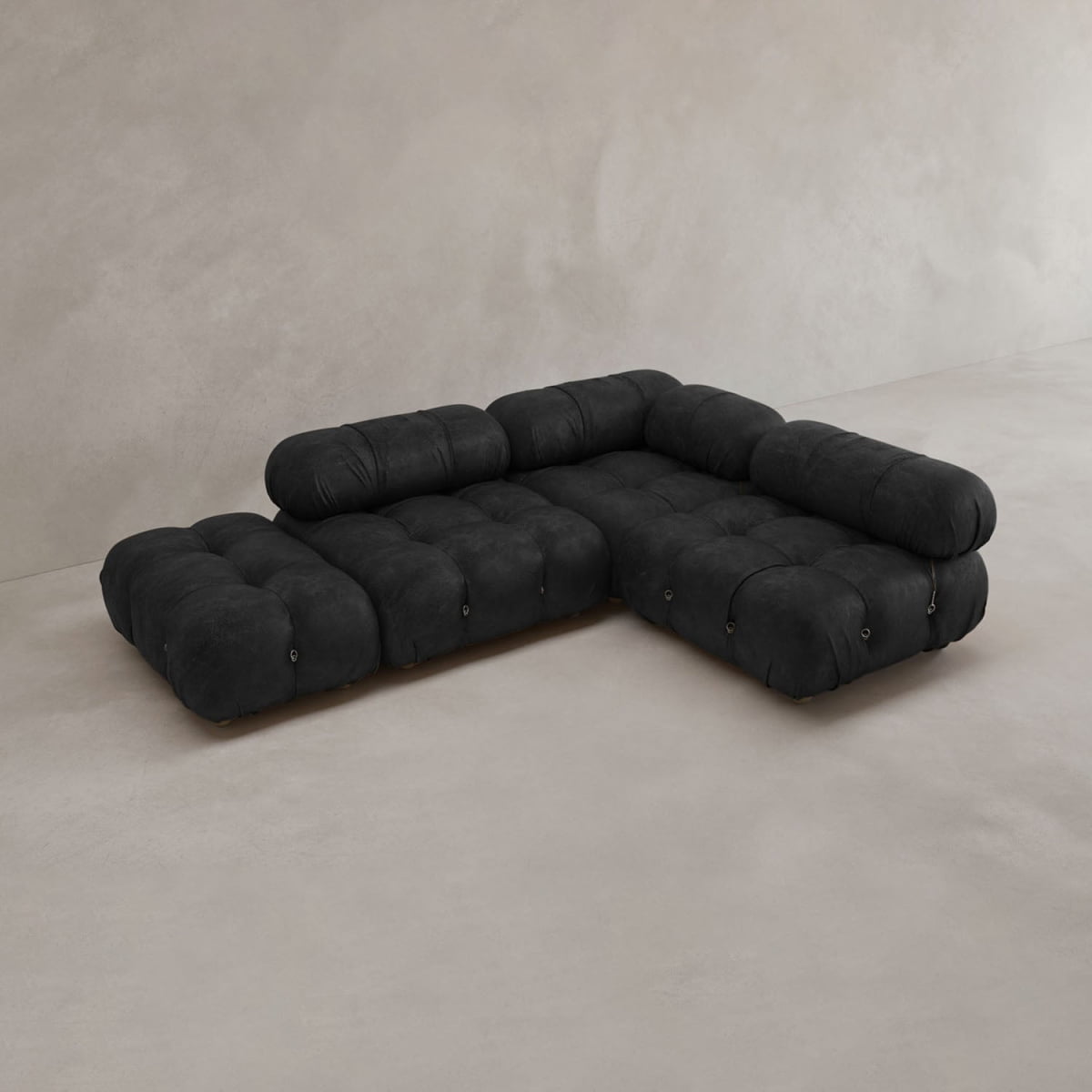 The Belmont Sofa Combination B, in classic black, brings timeless elegance to any room.