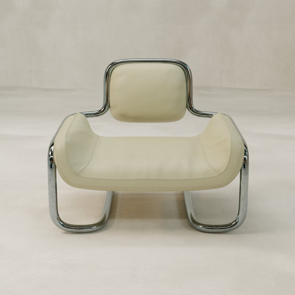 The Citron Chair is a modern lounge chair with a cream cushioned seat and backrest, set on a shiny, curved chrome frame that highlights its contemporary style on a light beige surface.