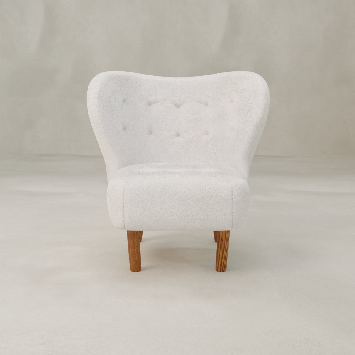 The Hornsey Chair, a modern tufted winged back chair with a curved backrest, button detailing, and wooden legs, is set against a light seamless background.